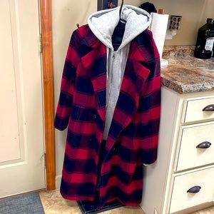 Kendall + Kylie wool coat with hooded sweatshirt under layer.